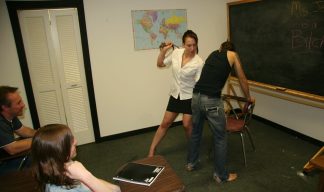 Cheyenne Jewels uses her belt to spank her student in the front of the class
